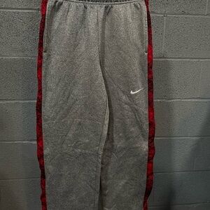 Nike Kids Gray Joggers with Red Stripes